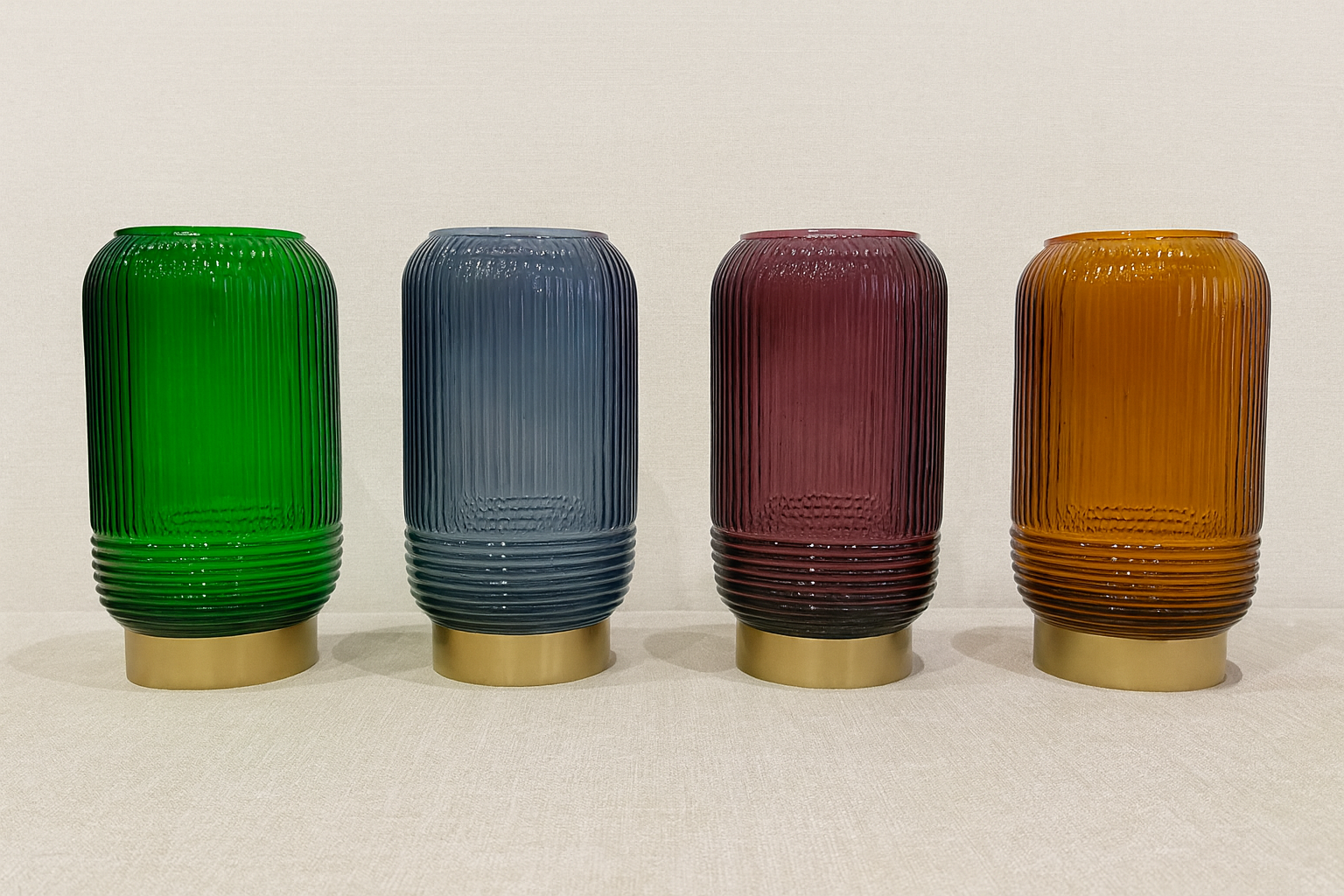 Colored ribbed glass vases with gold bases modern home decor collection Modern ribbed glass vases in jewel tones with gold pedestal bases