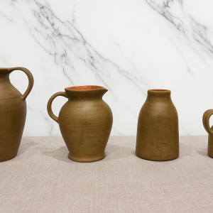 Rustic Brown ceramic pottery vases with terracotta interior farmhouse home decor on neutral table