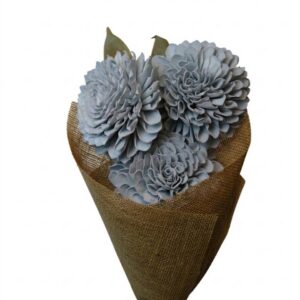 Grey dahlia flower with leaves