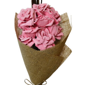 Coral pink bourbon rose with cattails