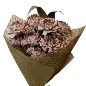 old pink folded rose with leaves