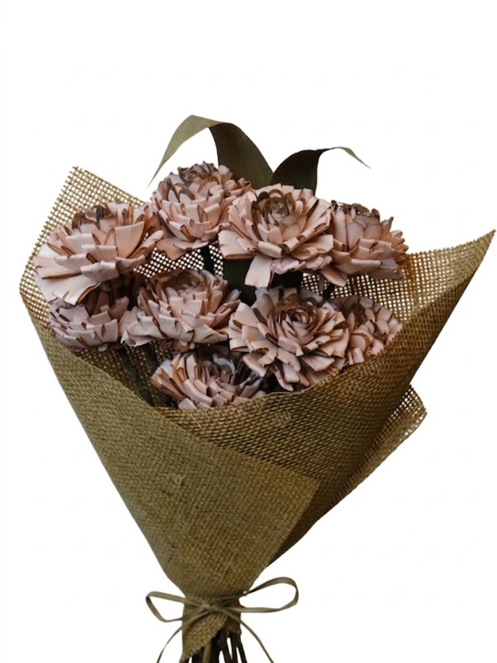 old pink folded rose with leaves