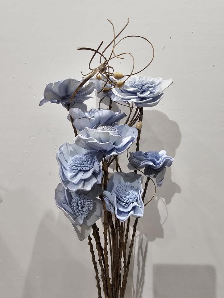light blue hydrangea with cattails